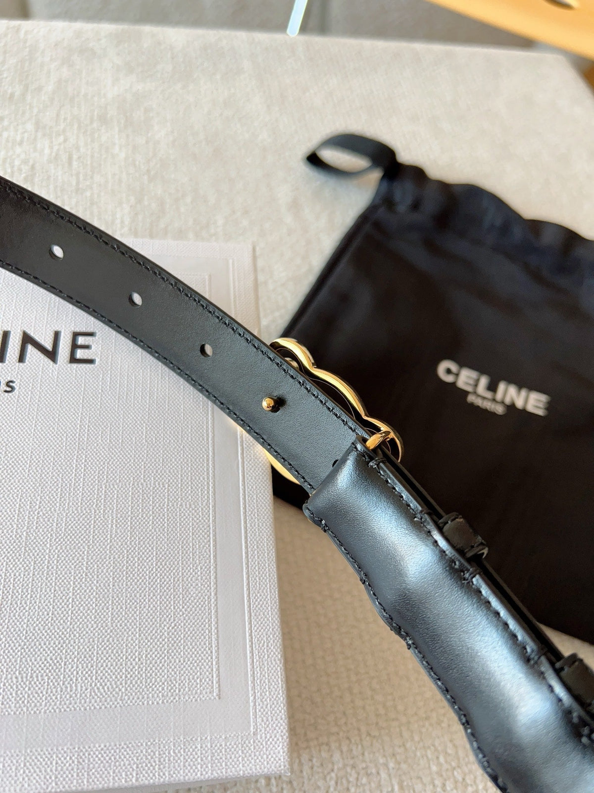 CELINE BELT 25MM TRIOMPHE LOGO CUT-OUT IN SMOOTH BLACK CALFSKIN WITH GOLD BUCKLE